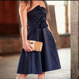 H&M navy strapless satin dress, with bodice boning. Size 38/8. Machine washable